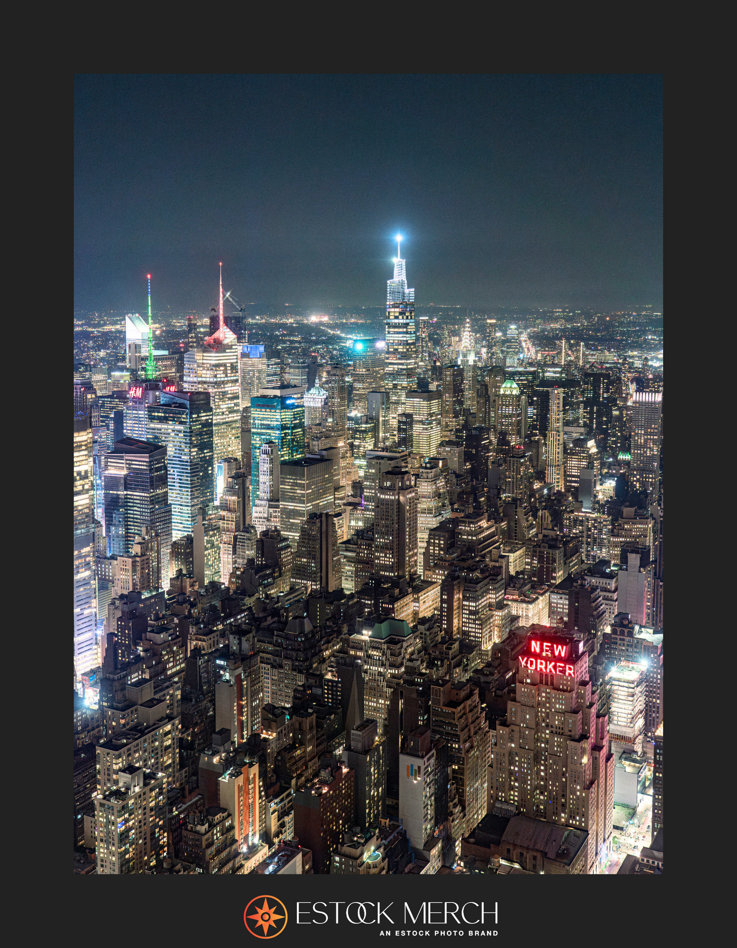 A nighttime cityscape view of  Midtown Manhattan with illuminated buildings